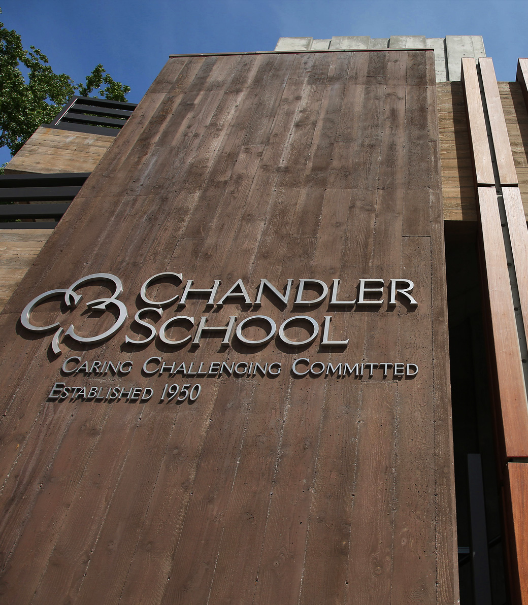 Exterior sign at the new parking structure at Chandler School in Pasadena. It reads: