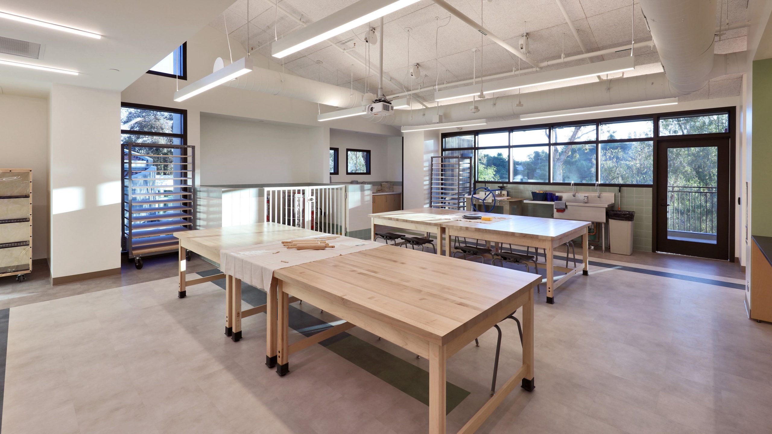 An empty cooking classroom at the Collaborative Learning and Innovation Center, a Los Angeles educational architectural project by Pica + Sullivan Architects.
