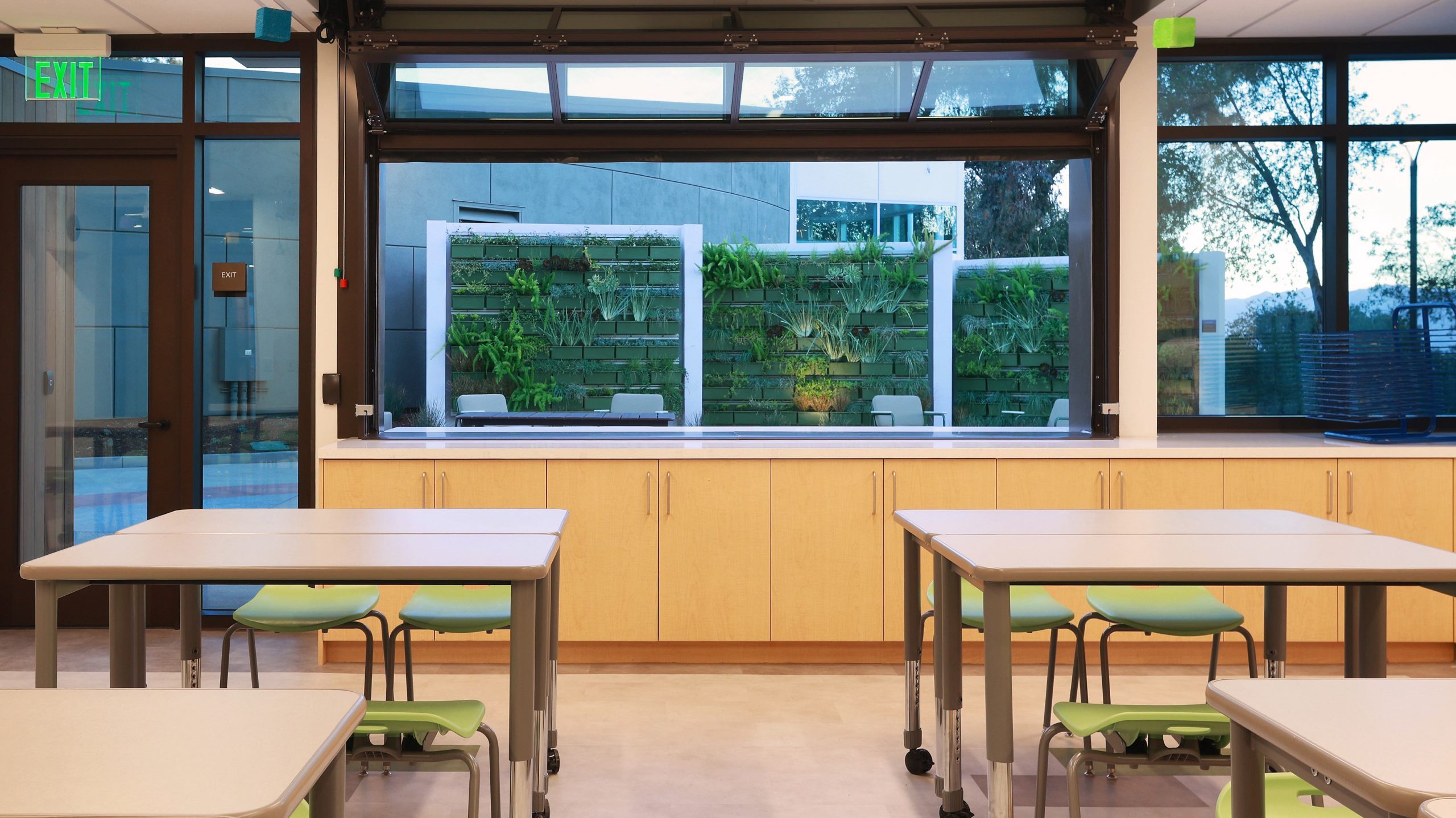 CLIC_018 An empty classroom and outside gardens at the Collaborative Learning and Innovation Center, a Los Angeles educational architectural project by Pica + Sullivan Architects.