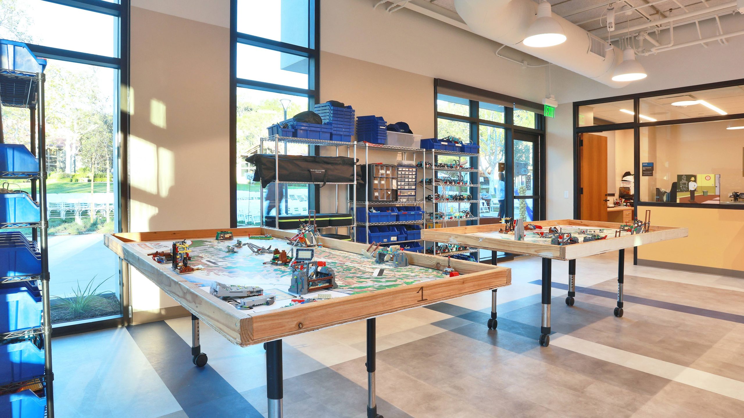 An empty classroom with building and engineering tools at the Collaborative Learning and Innovation Center, a Los Angeles educational architectural project by Pica + Sullivan Architects.