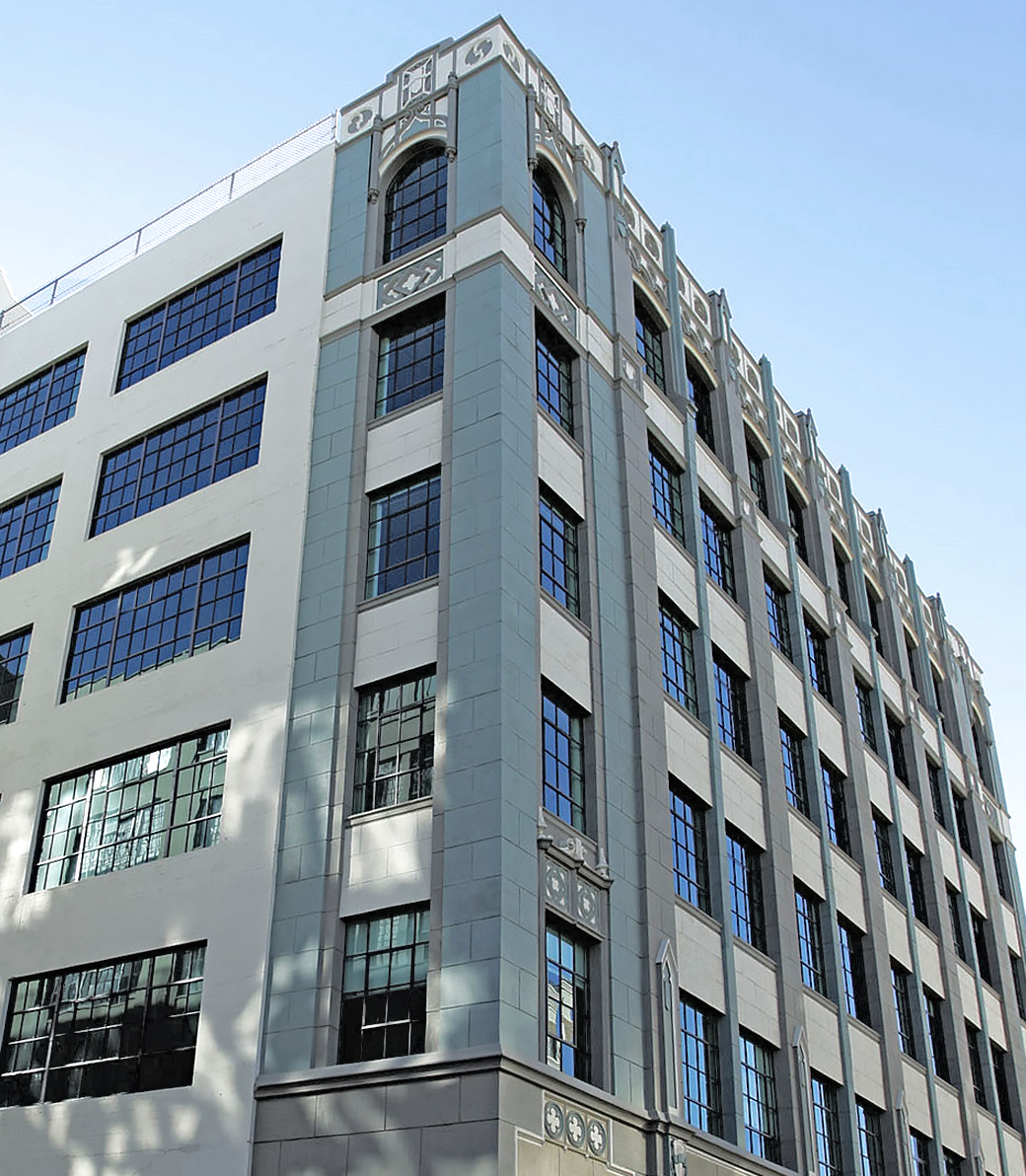 Exterior of the Downtown Women's Center in Los Angeles, a Pica+Sullivan Southern California non-profit architectural renovation project, from a low angle.