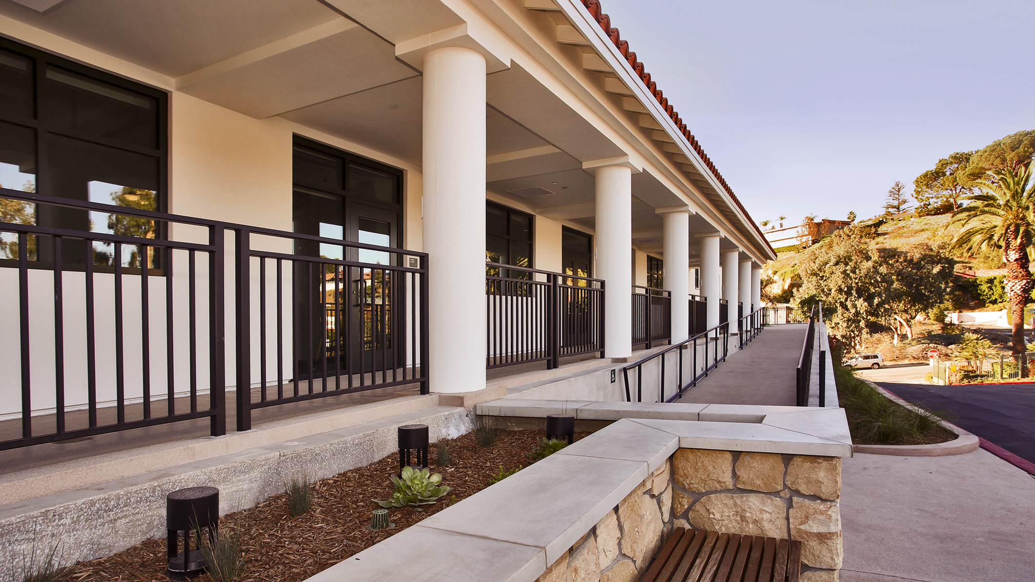 Daytime at the wheelchair ramp at the Mozilo Family Center for the Arts at the Flintridge Sacred Arts Academy, an educational architectural project in Southern California.