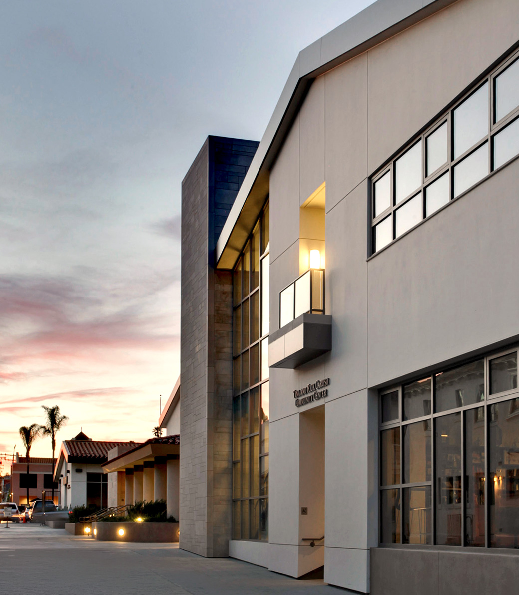 Sunset exterior of the front of the Saint Monica Community Center in Santa Monica, a Pica+Sullivan Southern California educational and religious architectural project.