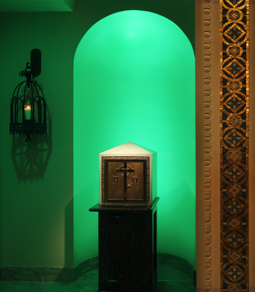 An alcove with a decorative religious item at the Saint Monica Church in Santa Monica, a Pica+Sullivan Southern California religious architectural renovation project.