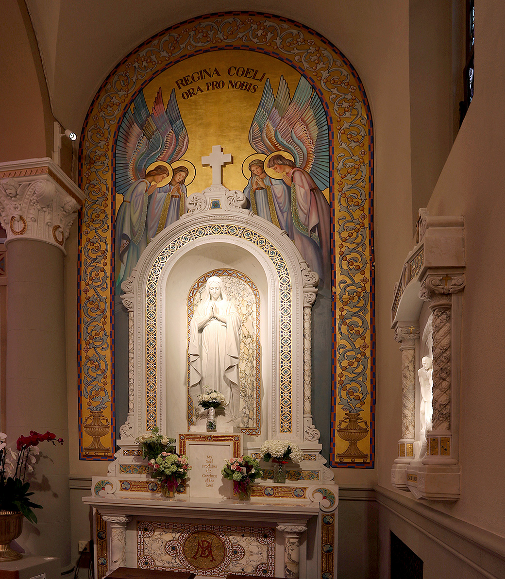 A marble altar to a female saint at the Saint Monica Church in Santa Monica, a Pica+Sullivan Southern California religious architectural renovation project.