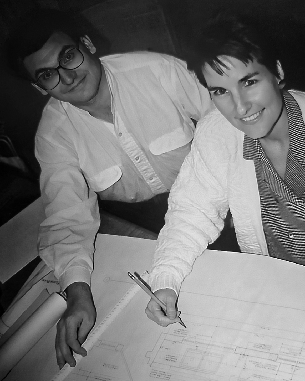 Black-and-white photo of a young Maureen Sullivan and Joseph Pica, Founding Principals of Pica + Sullivan, a Los Angeles-based educational, religious, & non-profit architecture firm.