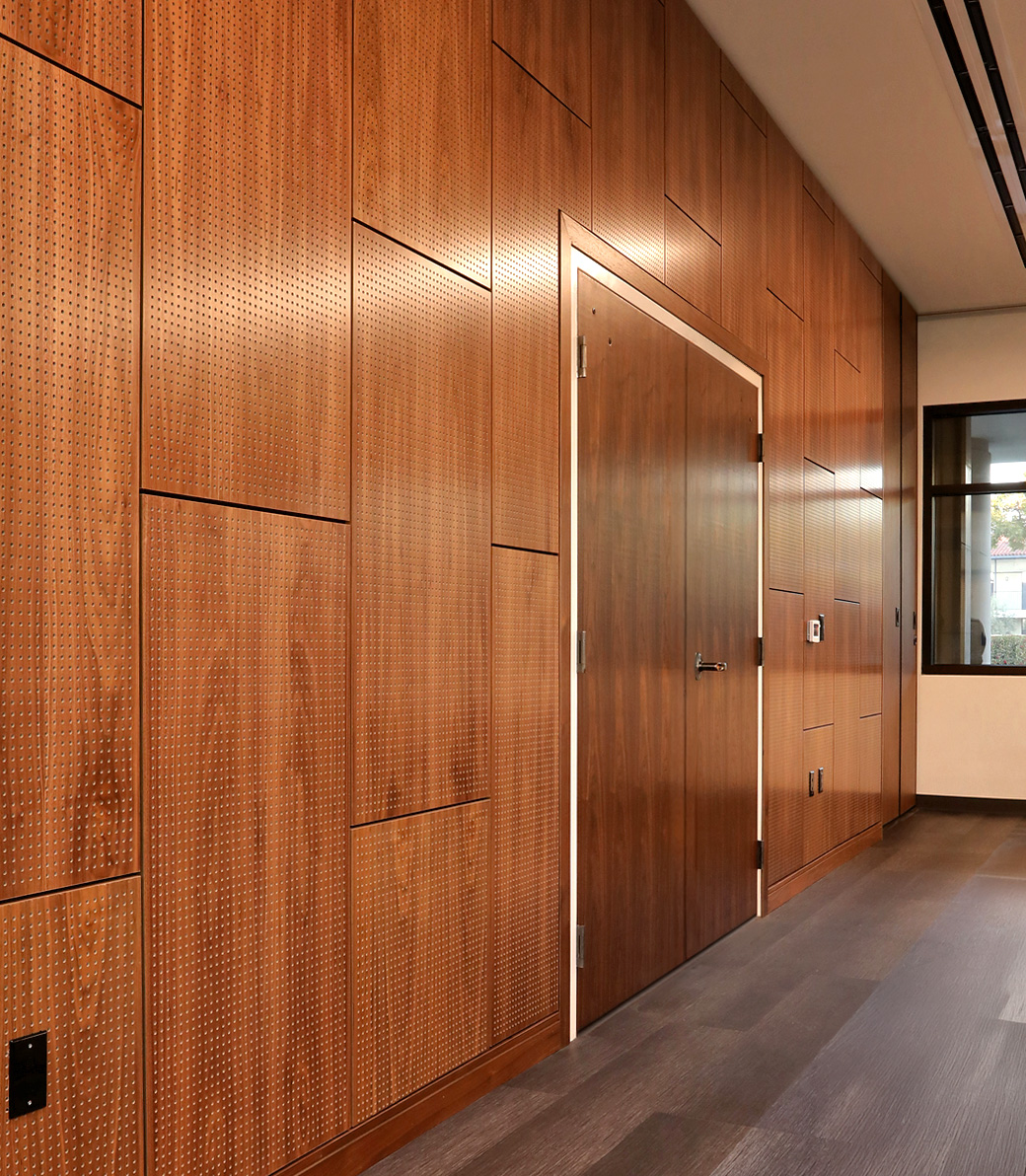 Wood wall and doors in the Holy Family Church Parish Center in Glendale, a Pica+Sullivan Southern California religious architectural project.