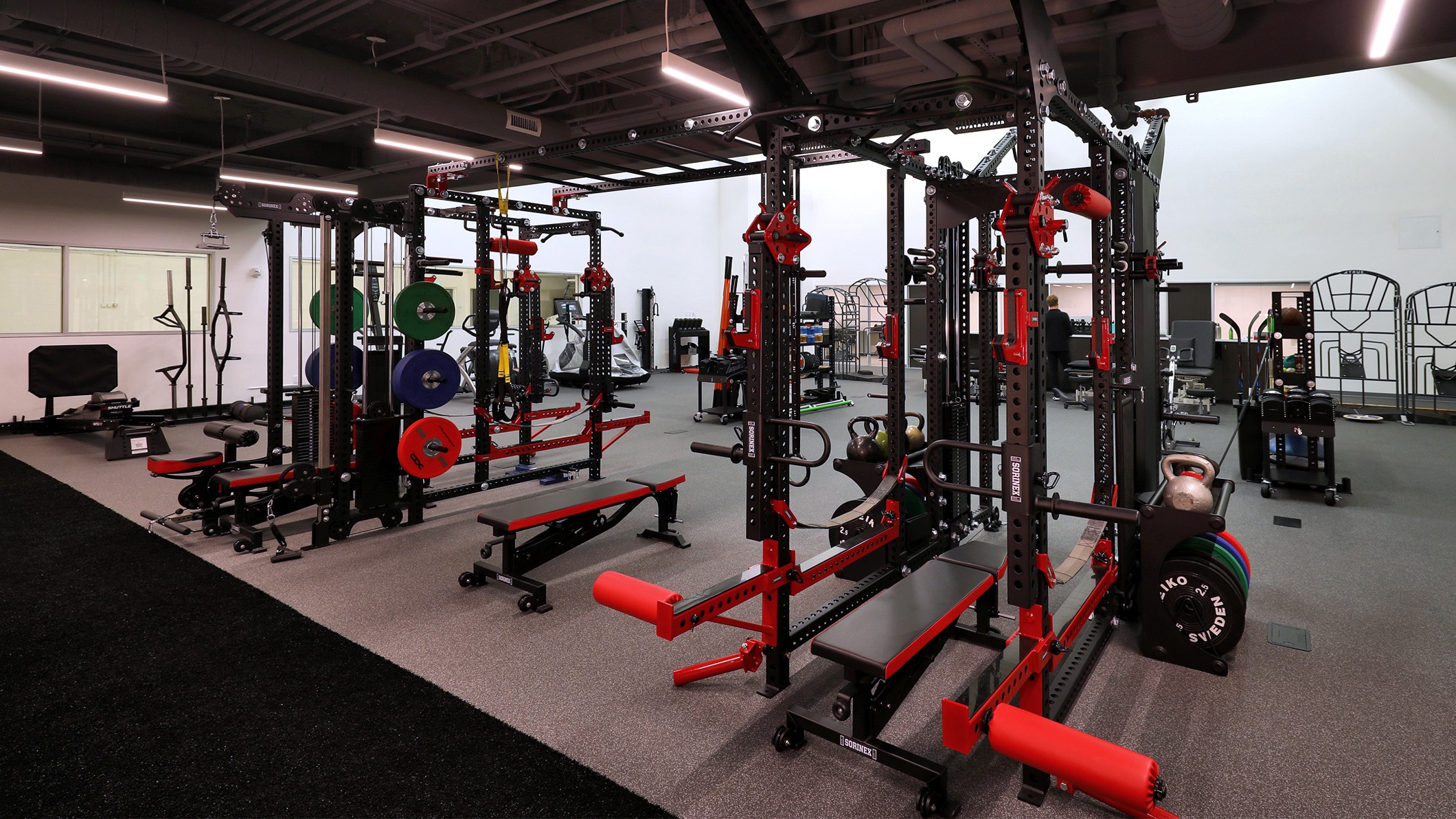 An empty weight room and exercise area at the LA Kings USC Meyer Sports Rehabilitation Center in El Segundo, a Pica+Sullivan Southern California architectural renovation project.