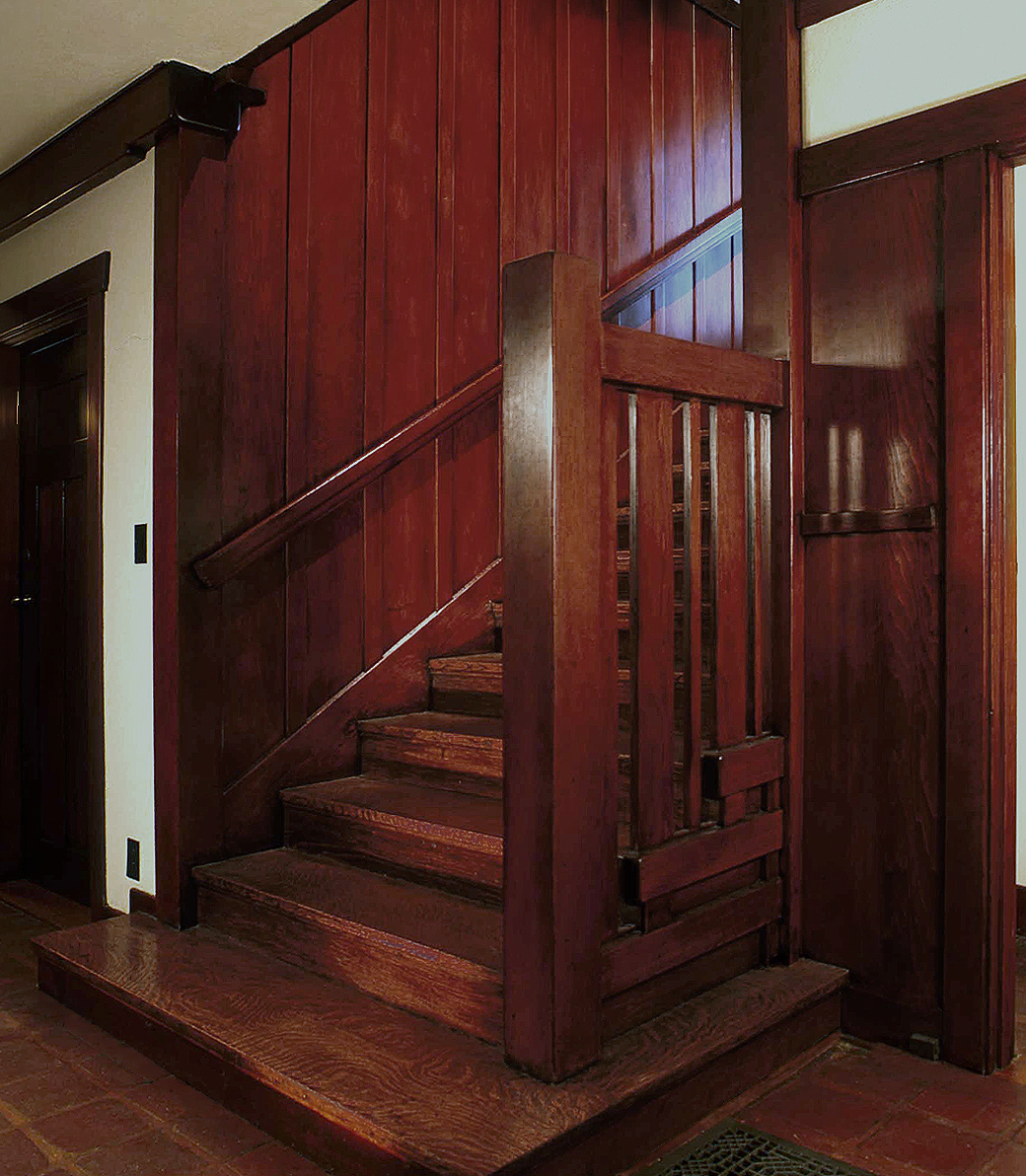 PITCAIRN_006 A wooden interior staircase in Pitcairn House in Pasadena, a Pica+Sullivan Southern California educational architectural renovation project.