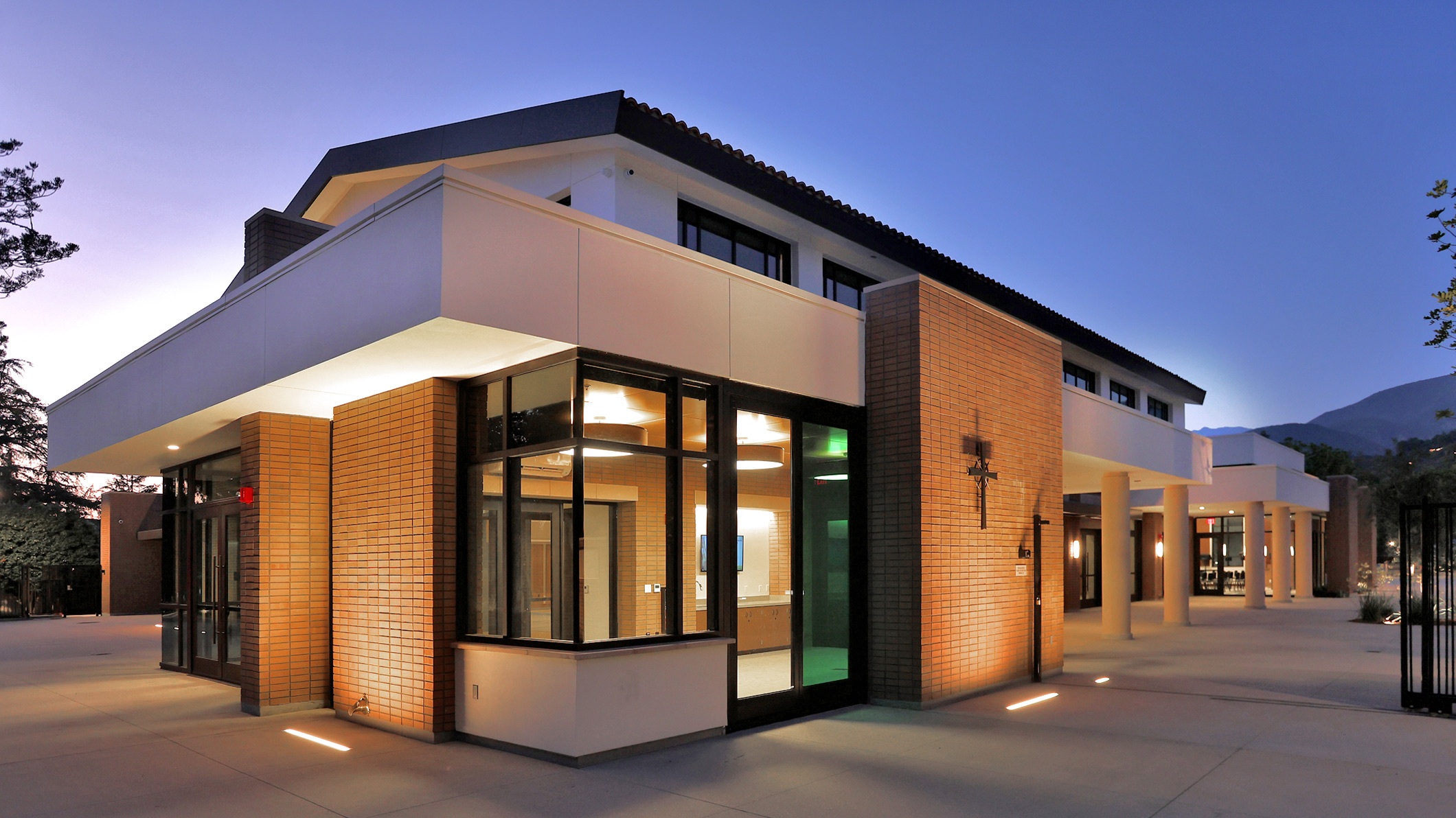 Nighttime exterior of Saint Bede the Venerable Parish Hall in La Cañada Flintridge, a Pica+Sullivan Southern California religious and educational architectural project.